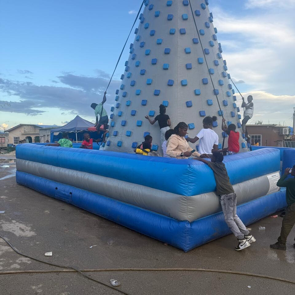 Children playing on bounce-about